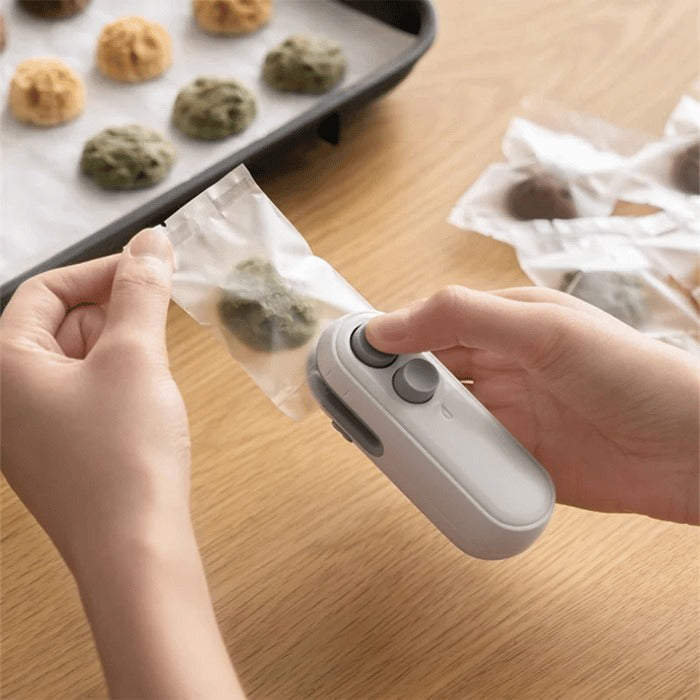 ✨ Última Venta 49% DE DESCUENTO 💥 Pequeña Selladora Magnética Recargable 2 en 1 para Snacks - Máquina de Sellado Mini para el Hogar